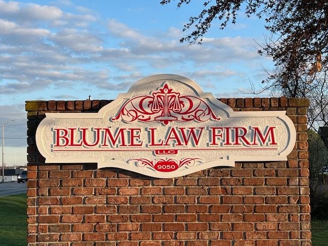 Blume Law Firm Sign